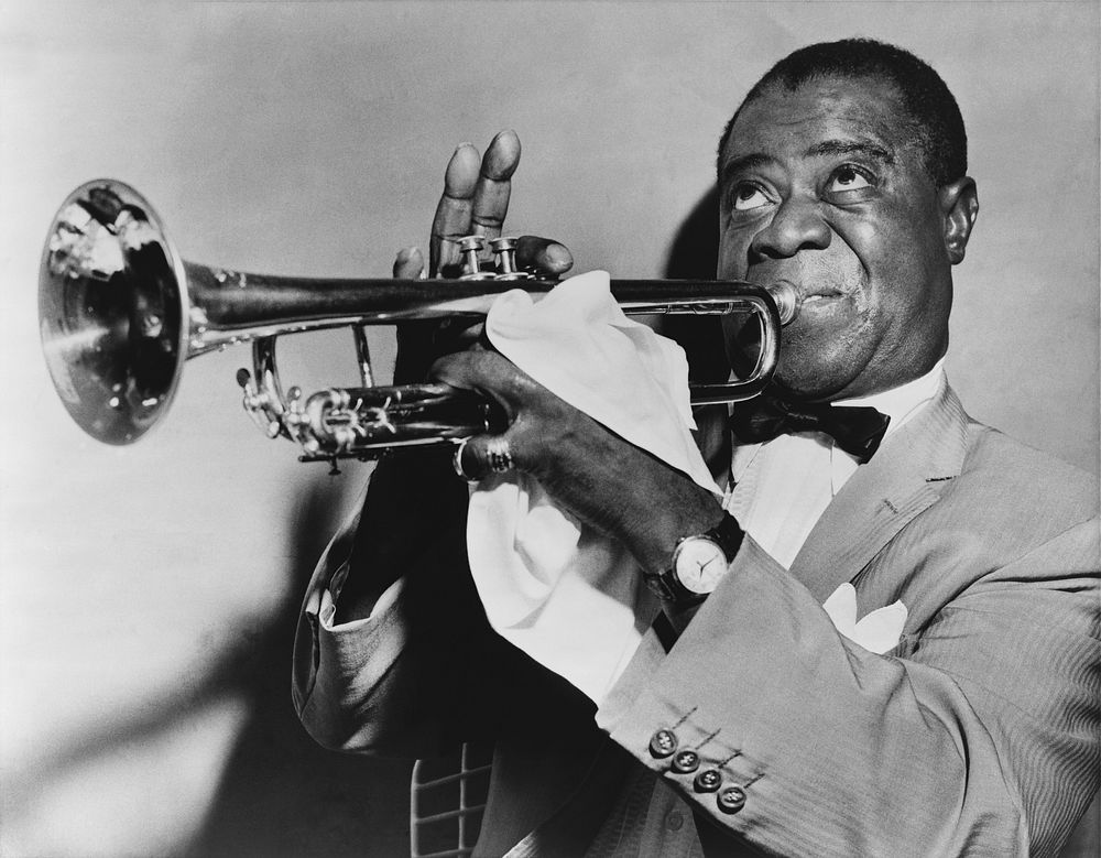 Louis Armstrong famous Jazz musician - unknown date & location 

More:
 View public domain image source here